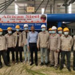 Adama Steel Factory CEO took a picture with workers of SME Group during the reheating furnace ignition ceremony