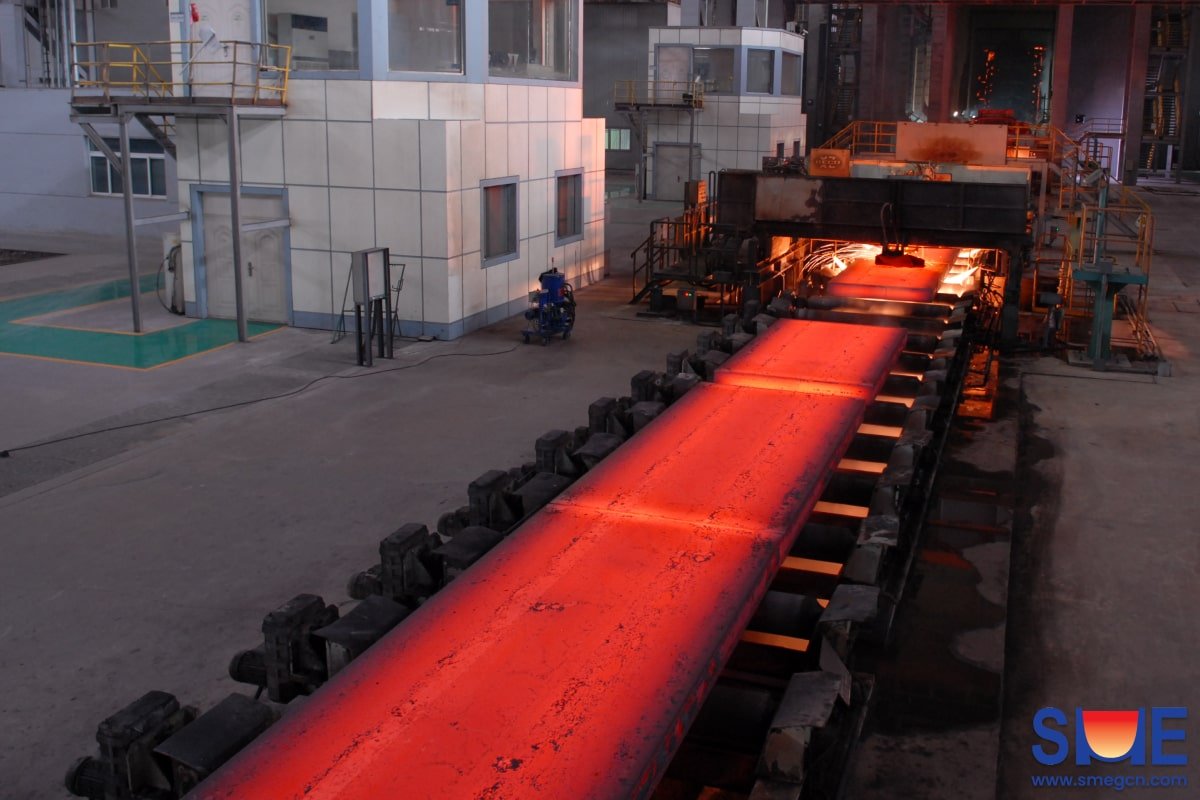 Steel slabs are being cut by flame cutting