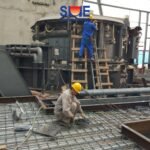 SME workers are installing the electric arc furnace for Nigeria steelmaking project