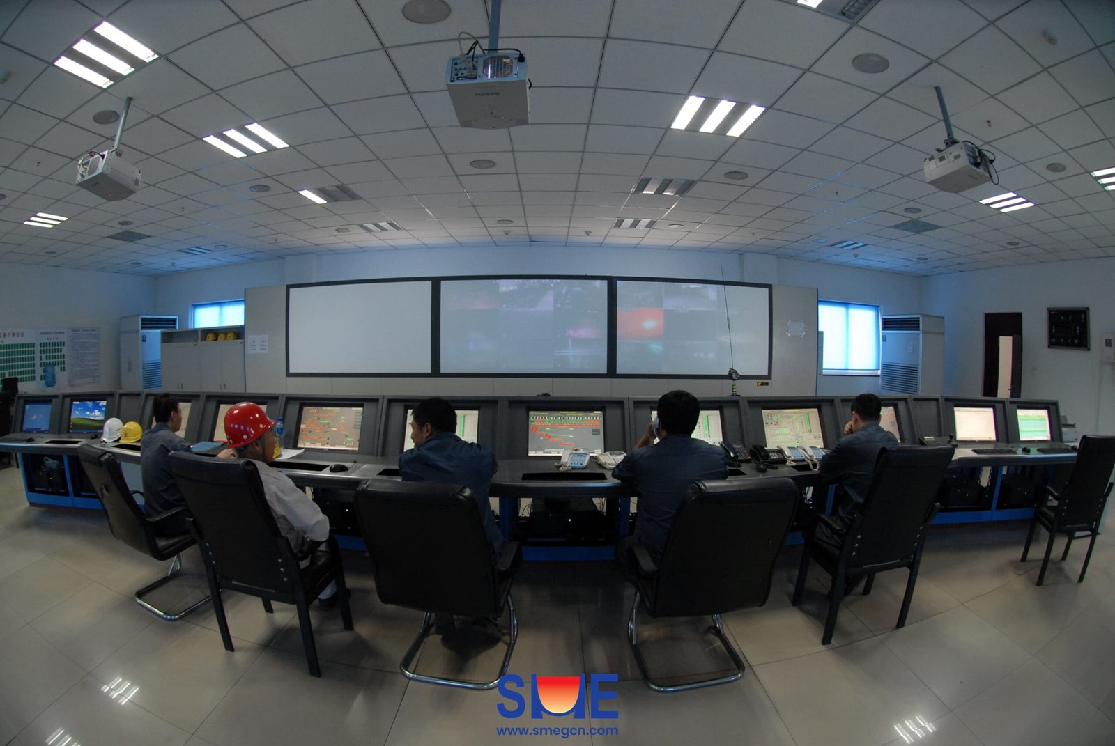 Engineers in the main control room