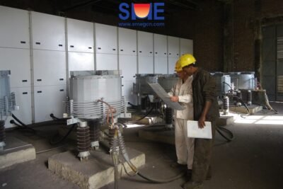 SME Engineer Discussing with Local Worker